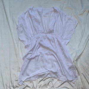 Medium white swimsuit cover. Never worn.